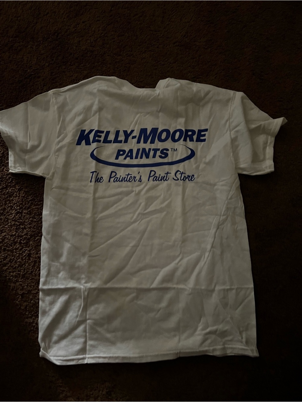 Kelly Moore White T-Shirt with Blue Tag Detail